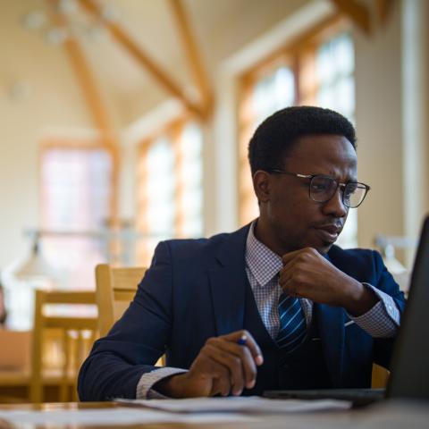 Student in a suit